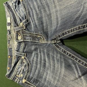 Miss Me Size 29 boot cut jeans.  Beige and white stitching detail on back